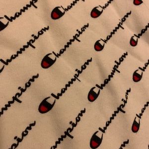 Champion all over Tee